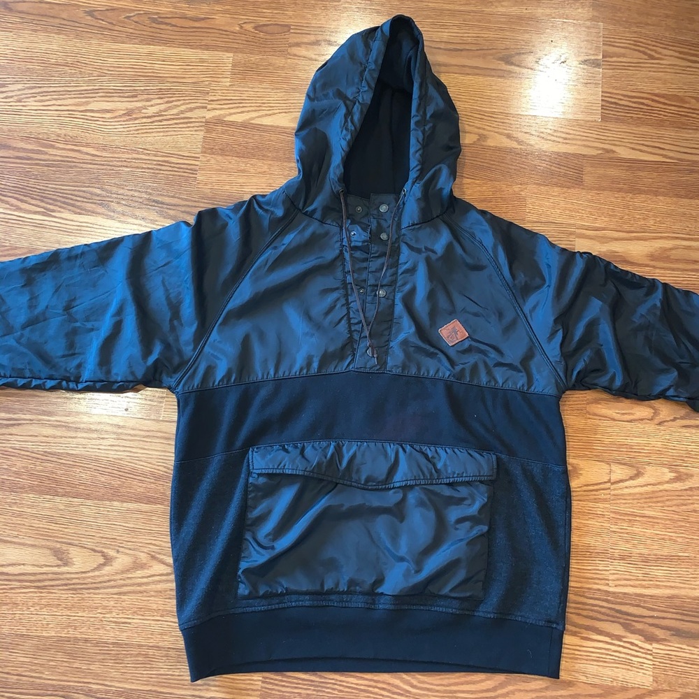 Black Volcom windbreaker with front pocket